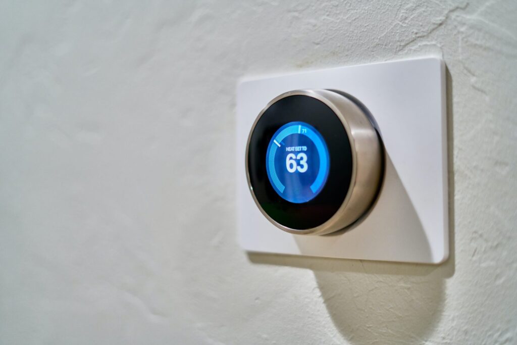 rfahj4ti37y gray Nest thermostat displaying at 63